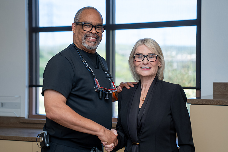 Dr. Wright shaking hands with patient
